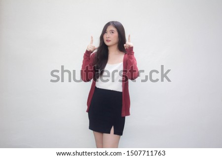 Portrait of thai adult working women size xl white shirt pointing