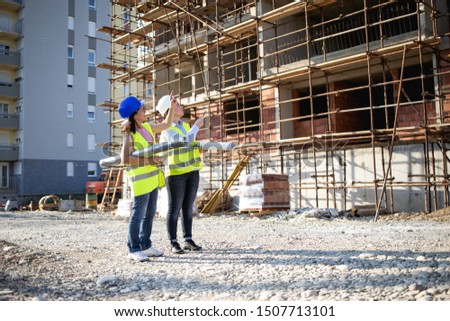 Construction workers having meeting,stock photo