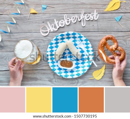 Color matching palette from Oktoberfest food picture with hand holding pretzel and blue-white decorations