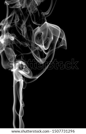 Moving smoke on black background.