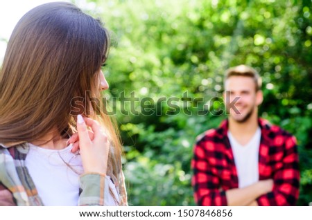 Get her attention. Man hipster falling in love pretty girl. Casual meeting. Love from first sight. If woman knows you like her how will she react. Fall in love. Pure feelings. Romantic date concept.