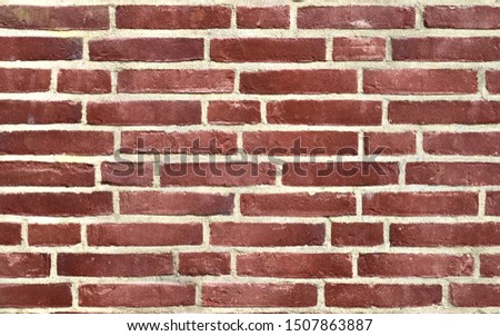 Detailed view on aged and weathered red brick walls at historical buildings in high resolution