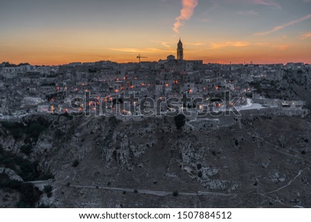 Matera_Italy. 
Cityscape image of medieval city of Matera, Italy during beautiful summer sunset.