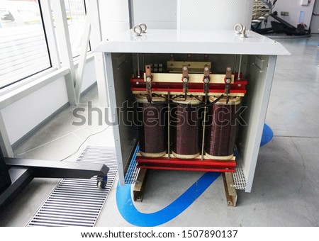Transformer with electric motor coil, in modern production room Royalty-Free Stock Photo #1507890137