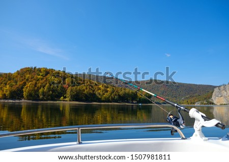 Fishing boats trolling in the fall, trolling fishing
