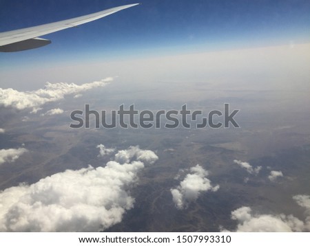 Beautiful view of cloud, Sky & mountain from airplane, areal view of sky