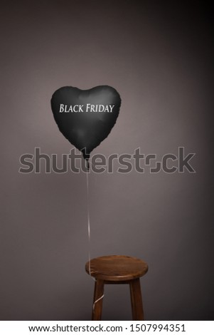 The inscription is black friday in a black balloon. Gray isolated background.