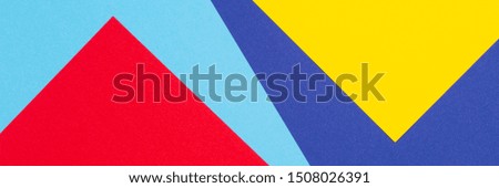Abstract blue, red and yellow color paper geometry composition background