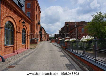 A combination of tradition and modernity. A red-brick residential and hotel complex - Loft , Aparts - details of the architecture of the city of Lodz