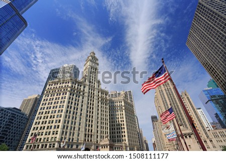 Chicago skyscrapers with American flag on the foreground, USA