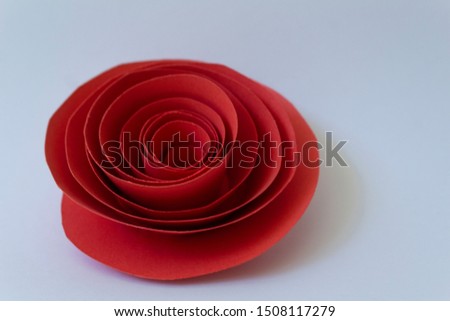 Close up bright red paper decorative romantic love rose floral holiday card on white background 