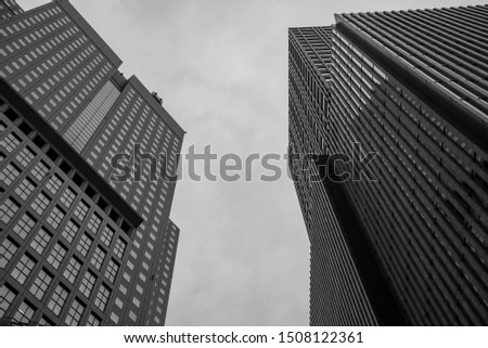 Black and white photo of financial district skyscrapers.