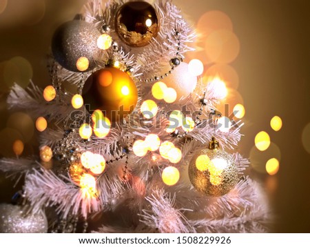 Christmas tree holiday  white gold  silver red green balls  trees ball  light decoration lights colorful  New Year blurred  lights background garland bokeh 