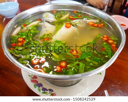 Mackerel with Spicy Soup in hot pot at a seaside restaurant in Eastern Thailand Royalty-Free Stock Photo #1508242529