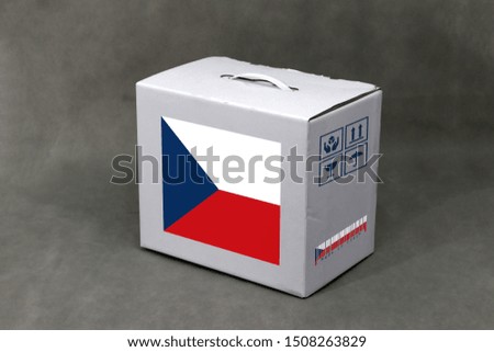Czech flag on white box and nation flag barcode with fragile symbol. The concept of export trading from Czech Republic, paper packaging for put products. 