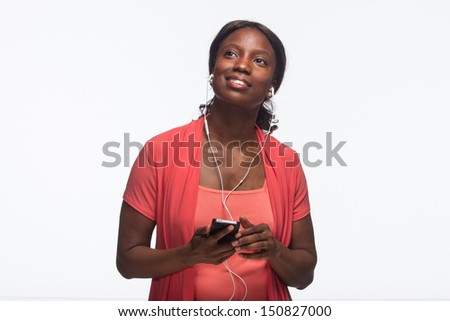Young African American woman with headphones, horizontal Royalty-Free Stock Photo #150827000