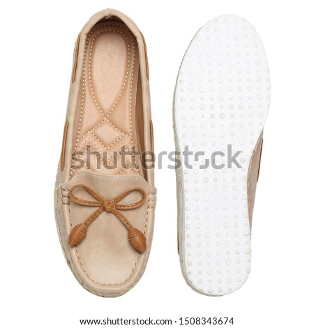beige women's loafer isolated on white background 