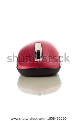 Computer mouse with isolated background. Help allows a smooth control of the graphical user interface. Red and white color computer mouse with white background.