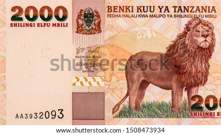 Mount Kilimanjaro; Savanna; African Lion. Portrait from Tanzania 2000 Shillings 2003 Banknotes. 