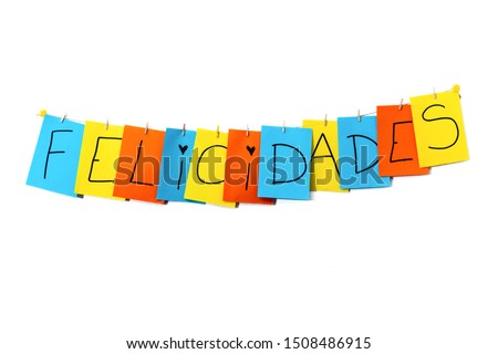 "Felicidades" Spanish word that means congratulations written by children in colorful pages