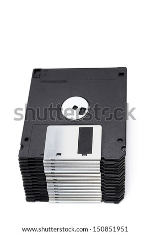 A pile of 3.5 floppy discs isolated on a white background