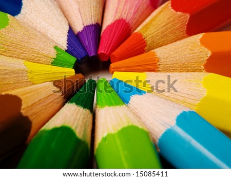 Color pencils in arrange in color wheel colors on white background Royalty-Free Stock Photo #15085411