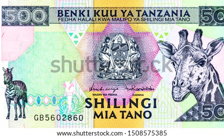 Zebra; Head of a giraffe, Portrait from Tanzania 500 Shillings (1997) Banknotes. 