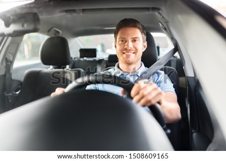 transport, vehicle and people concept - smiling man or driver driving car Royalty-Free Stock Photo #1508609165