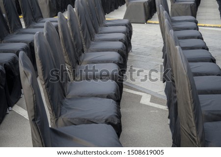 rows of chairs for an outdoor event