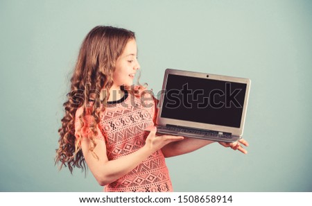 shopping online. school project. home schooling education. kid development in digital age. Play internet surfing. startup business. happy small girl with notebook. small publisher. publishing house.