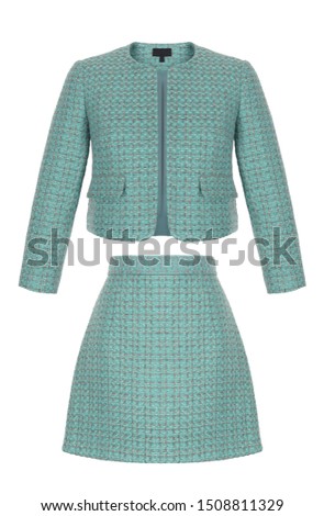 Luxurious fashionable woolen classic sequined checkered dark turquoise women costume, long-sleeved jacket and short skirt, clipping, ghost mannequin, isolated on white background Royalty-Free Stock Photo #1508811329
