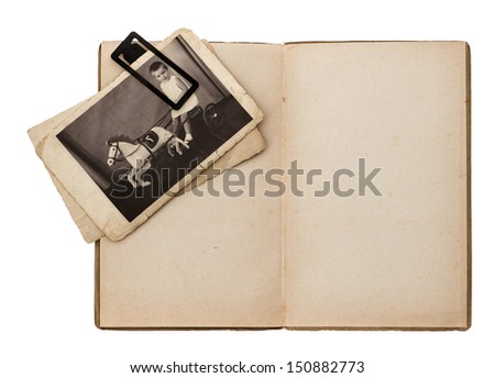 open old book with retro baby picture isolated on white background