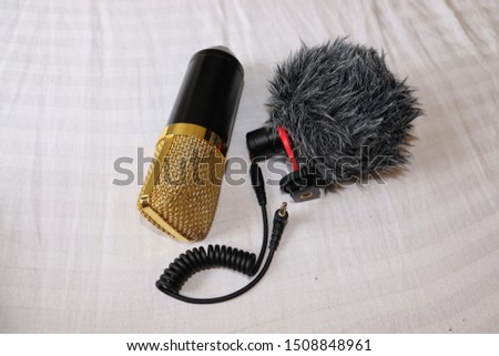 Condenser Microphones that are used for audio and song recording. Voice over and noise cancellation devices in a studio. DSLR external camera mic.
