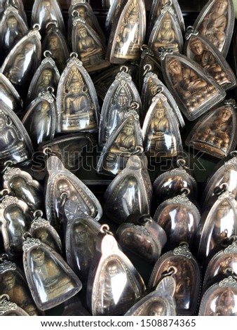 Many ancient amulets  and buddist talismans in Thailand amulet market. Thai people believe that the amulets bring good luck and protect evil for them.