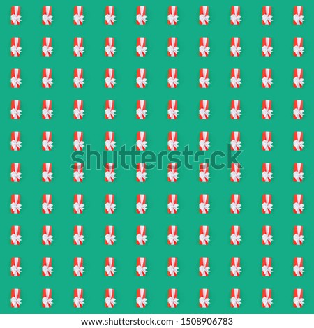 Seamless christmas or birthday pattern with red gift box over the pastel blue background. Christmas, holiday, birthday or surprise  concept. winter holidays print for textile, wallpaper, fabric, 