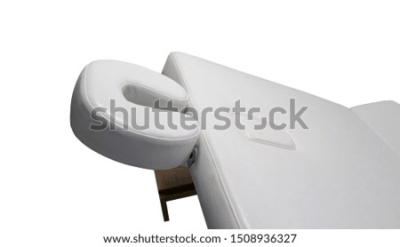 Portable massage table on white background