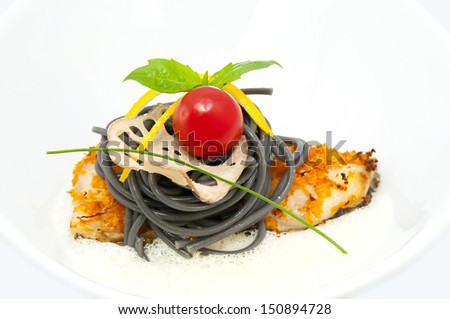 baked fish with black and white spaghetti sauce