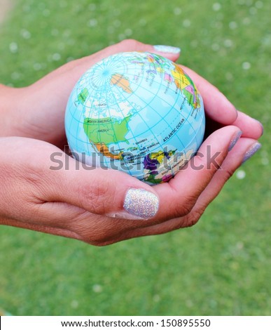 protect the planet globe world earth Hands climate change concept holding above grass photo, stock, photograph, image, picture 