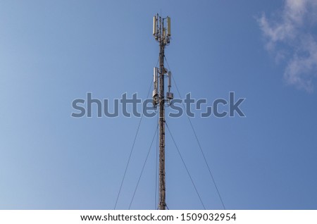 A cell repeater, a mast for broadcasting wireless communications and the Internet against the sky, modern technology ensures uninterrupted mobile transmission and reception of radio signals.
