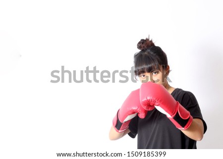 The Asian woman do workout on the white background.