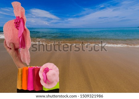 Pink hat with a turquoise sea background