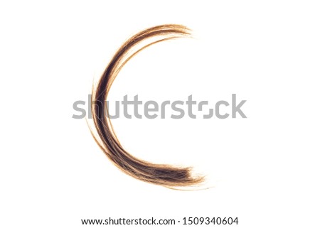 Letters made from woman hair capital C isolated on white background.