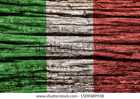 Italy flag on an old decrepit wooden surface. Textured background for creativity and design.