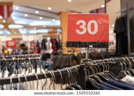 30% off sign in a clothing store