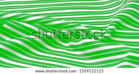 silk striped fabric. green white stripes. This beautiful, super soft, medium-sized silk blend is perfect for your design projects. It is brushed on the back for a luxurious feeling.