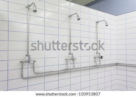 Showers gym indoor sports complex, toilet Royalty-Free Stock Photo #150953807