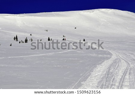 Beautiful winter pictures in the mountains. The abundance of snow and blue sky.
