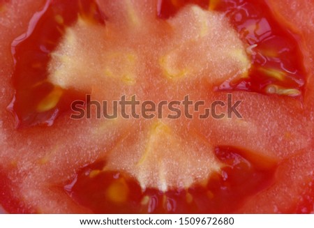 background of juicy tomato, the core of ripe vegetable.