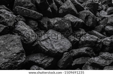 Coal mining. Natural industrial pile of black coal or bituminous coal  Royalty-Free Stock Photo #1509691235