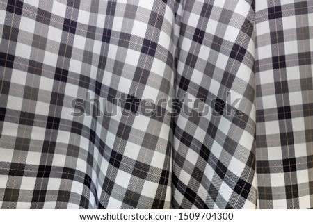 brown and white checkered fabric texture background
